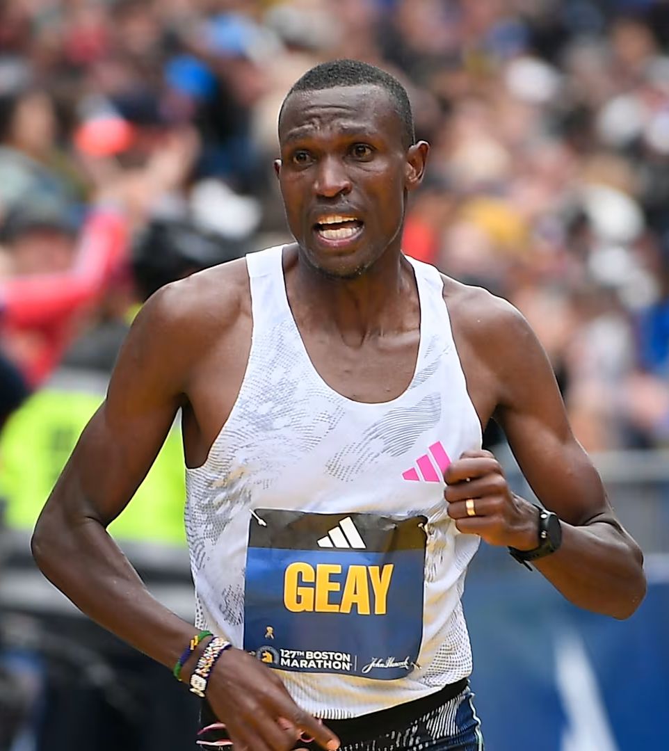 Heroic Tanzanian runner finishing a marathon